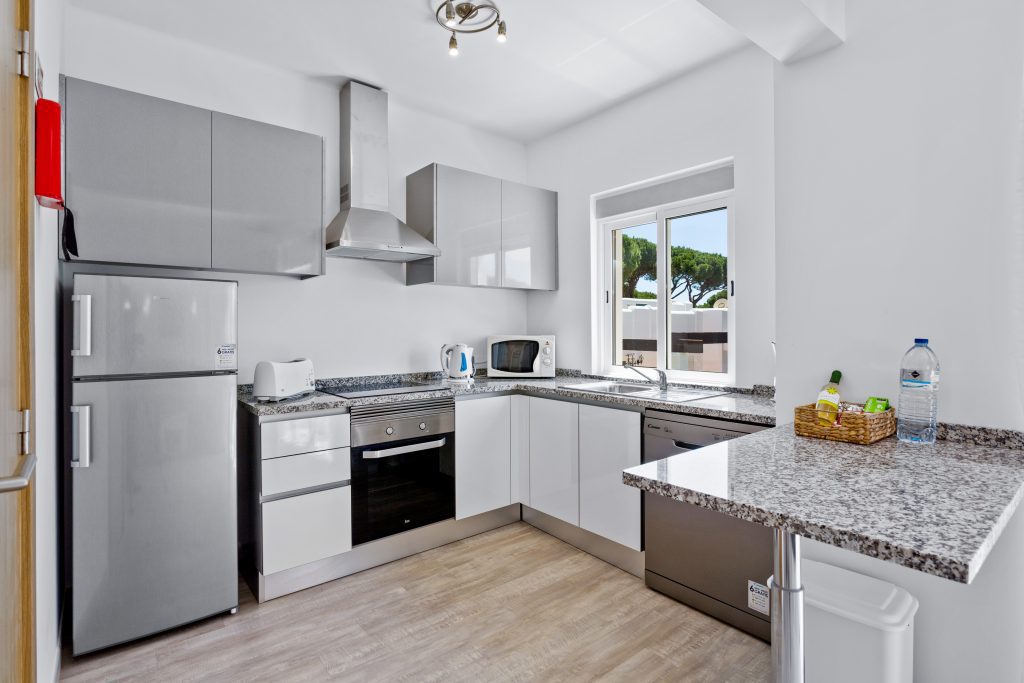 Prado Villas fully equipped kitchen with oven,stove,washing machine and fridge/freezer