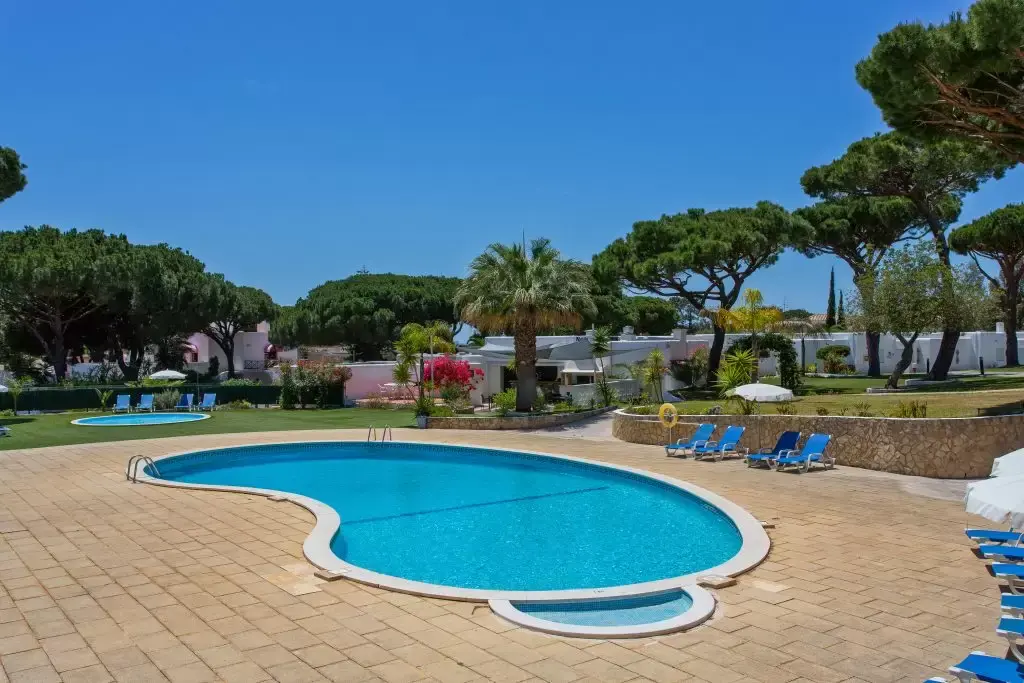 Algarve Villa Holidays Algarve Villa Holidays - Large pool surrounded by blue sunbeds